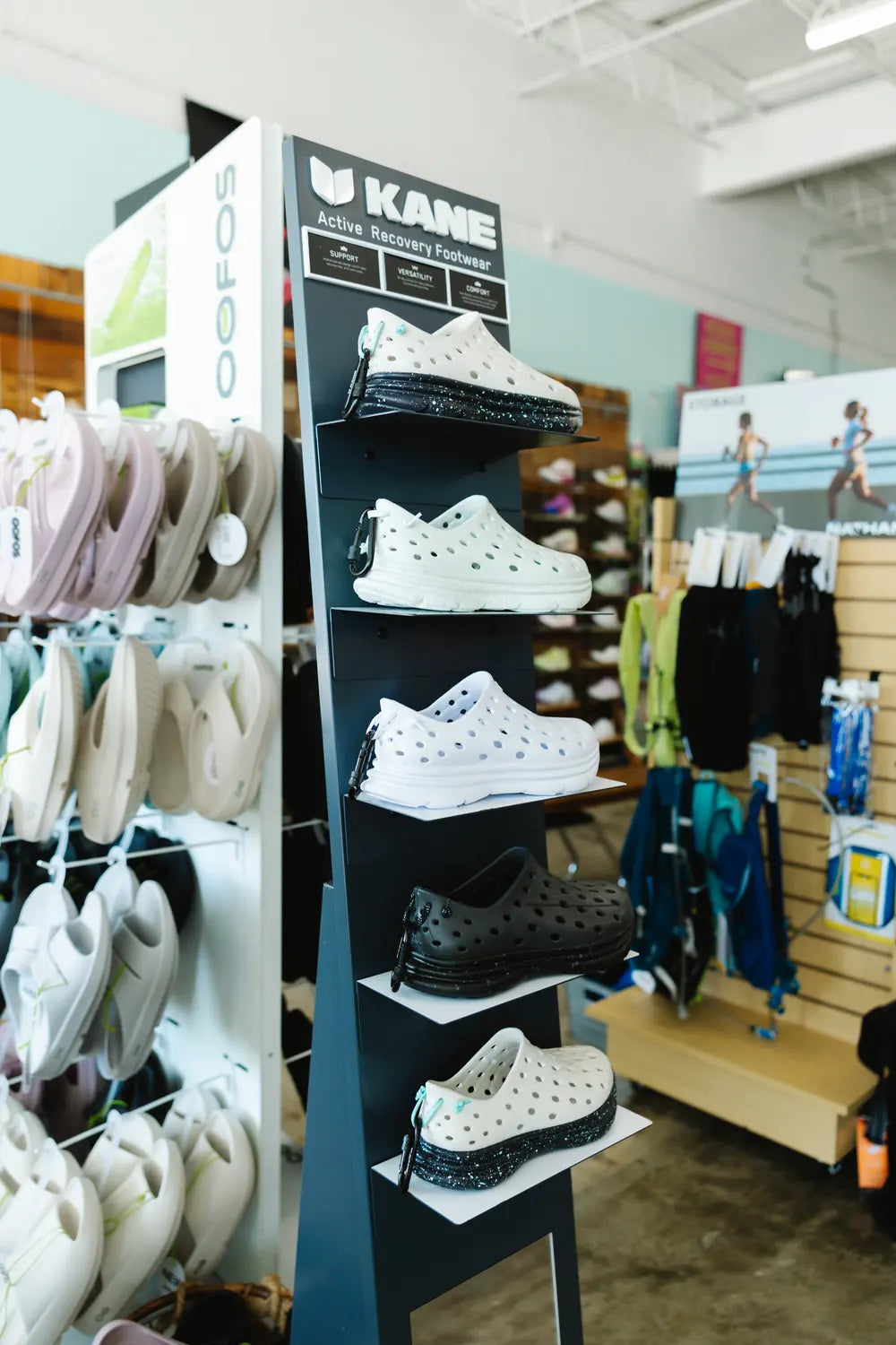Kane recovery shoes on a display tower