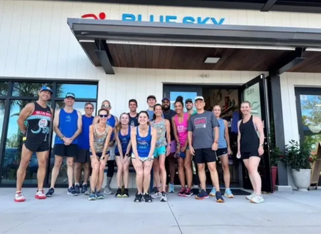 Runners gathered outside the Blue Sky Endurance Carolina Park store for the Monday night group run